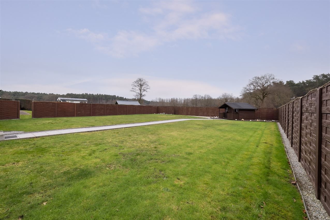 Netjes onderhouden woning op 11a95 grenzend aan agrarisch gebied foto 33