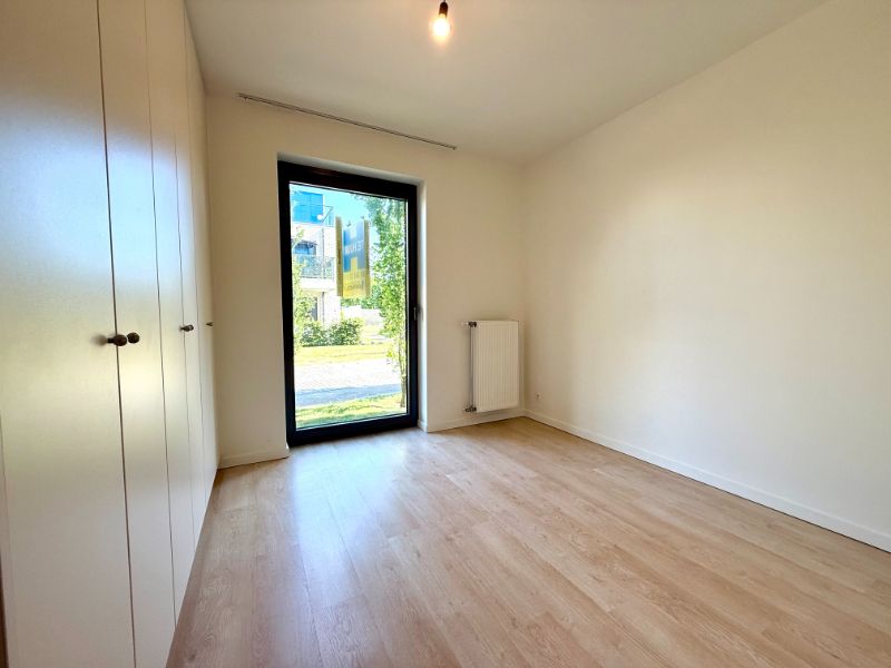 Centraal gelegen, gelijkvloers appartement met 2 slaapkamers en ruim terras met zicht op de Leie foto 13