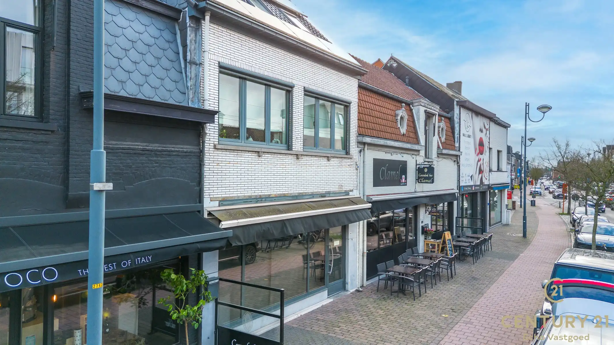 Handelszaak met gerenoveerde woonst op topligging  foto 3