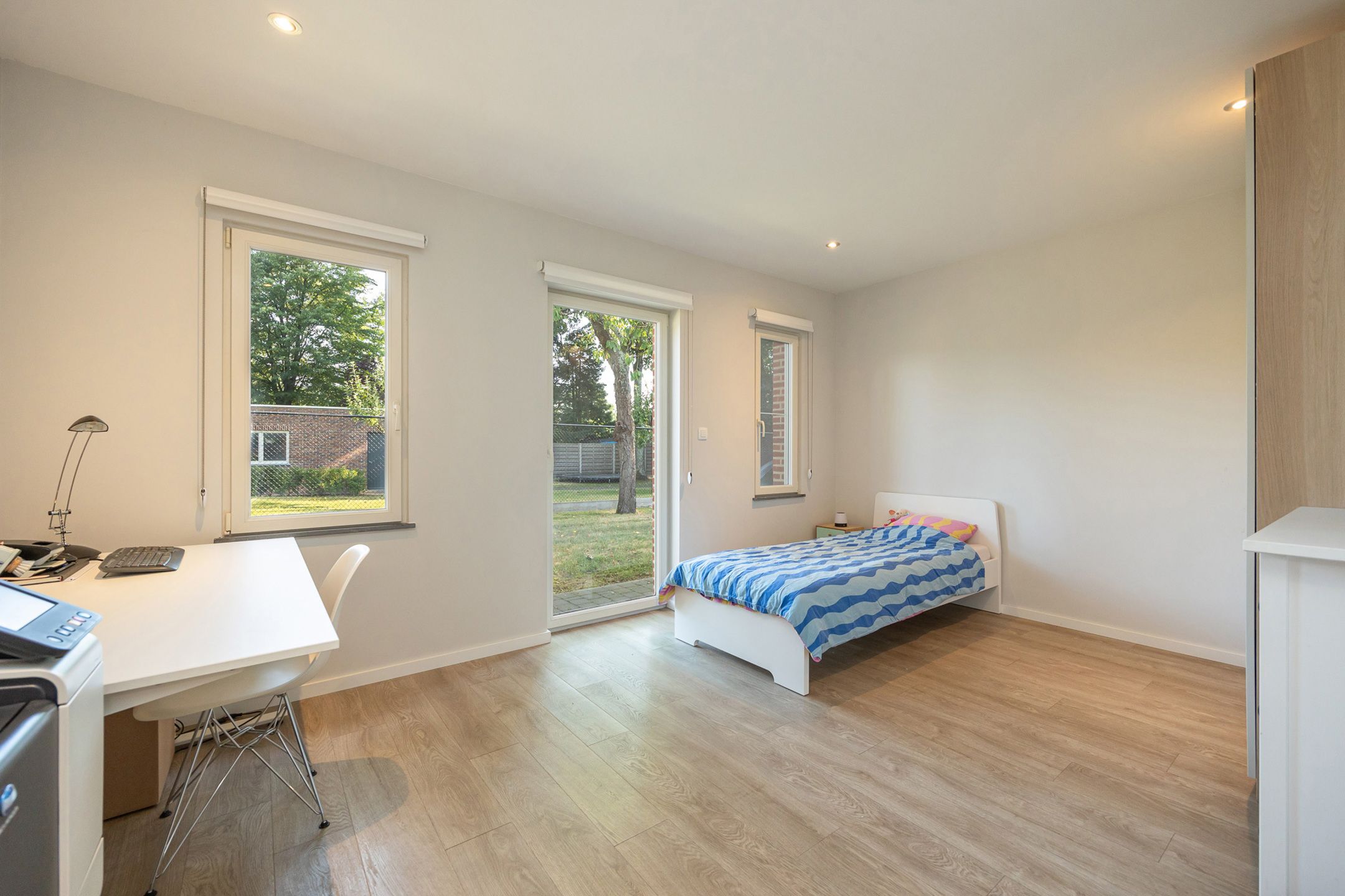 Vrijstaande gelijkvloers woning met ruime tuin en parking foto 9
