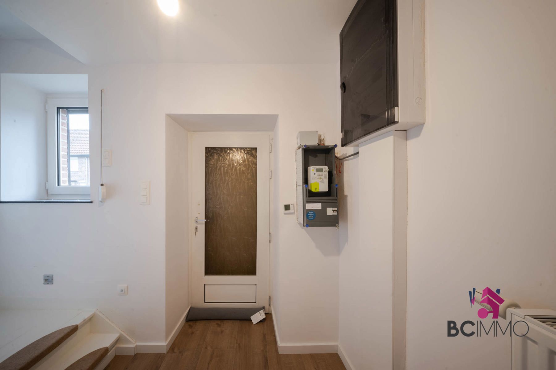 Instapklare halfopen woning op ruim hoekperceel in rustige woonwijk van Genk foto 14