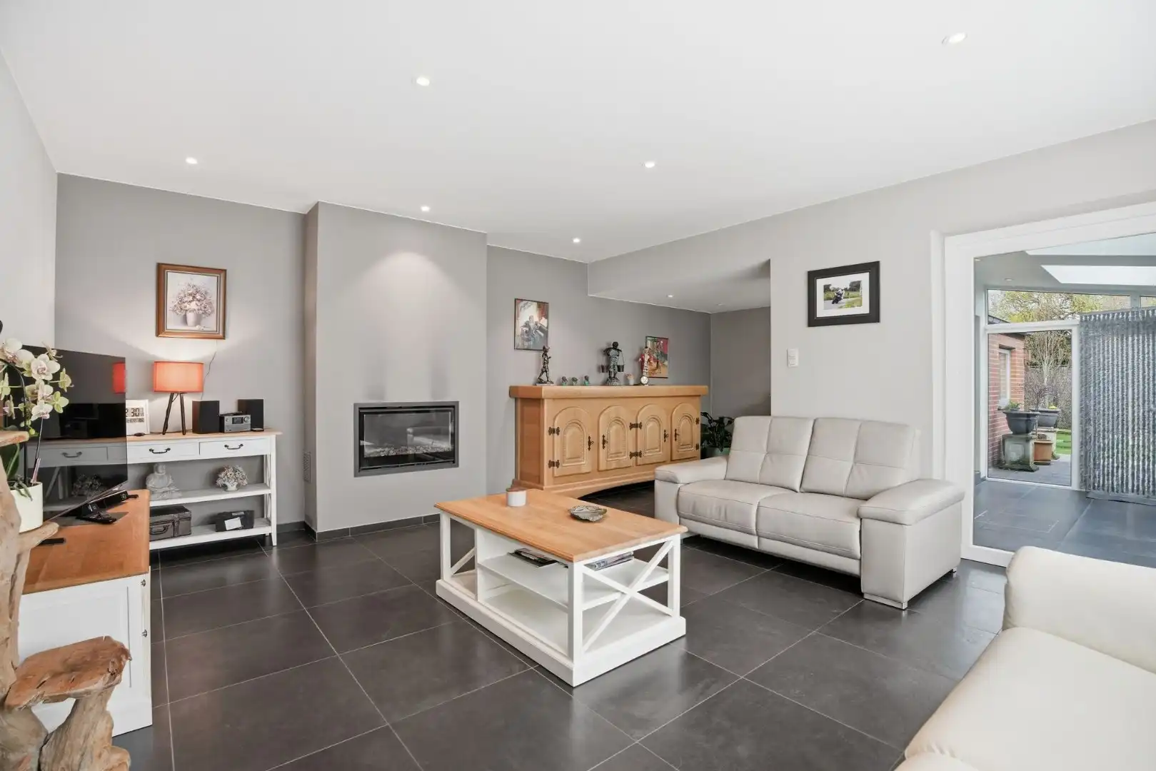 Grote halfopen woning met mogelijks 4 kamers, garage, zonnepanelen en tuin foto 9