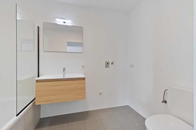 Gerenoveerd appartement met ondergrondse autostaanplaats TE KOOP in GENT! foto 16