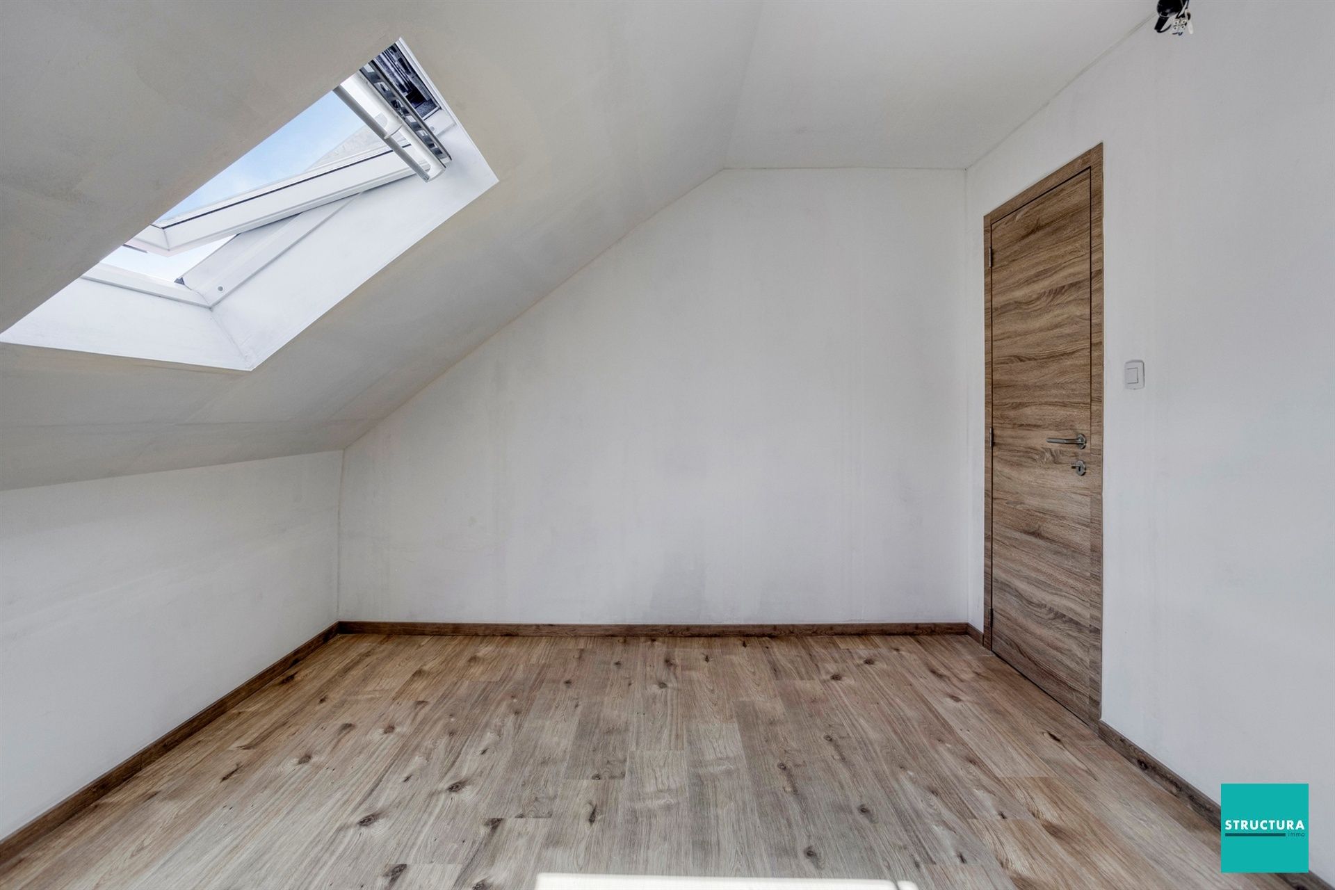 Instapklare woning met karakter in hartje Merchtem foto 27