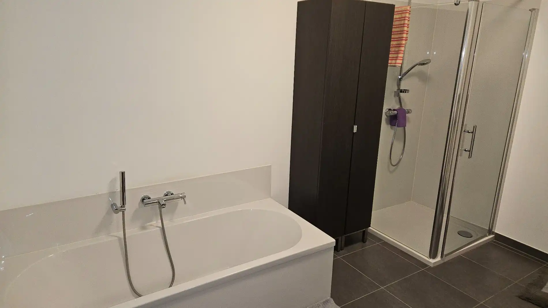 Ruim gelijkvloers app met 2 slk, terras, tuin en ondergrondse autostaanplaats foto 15