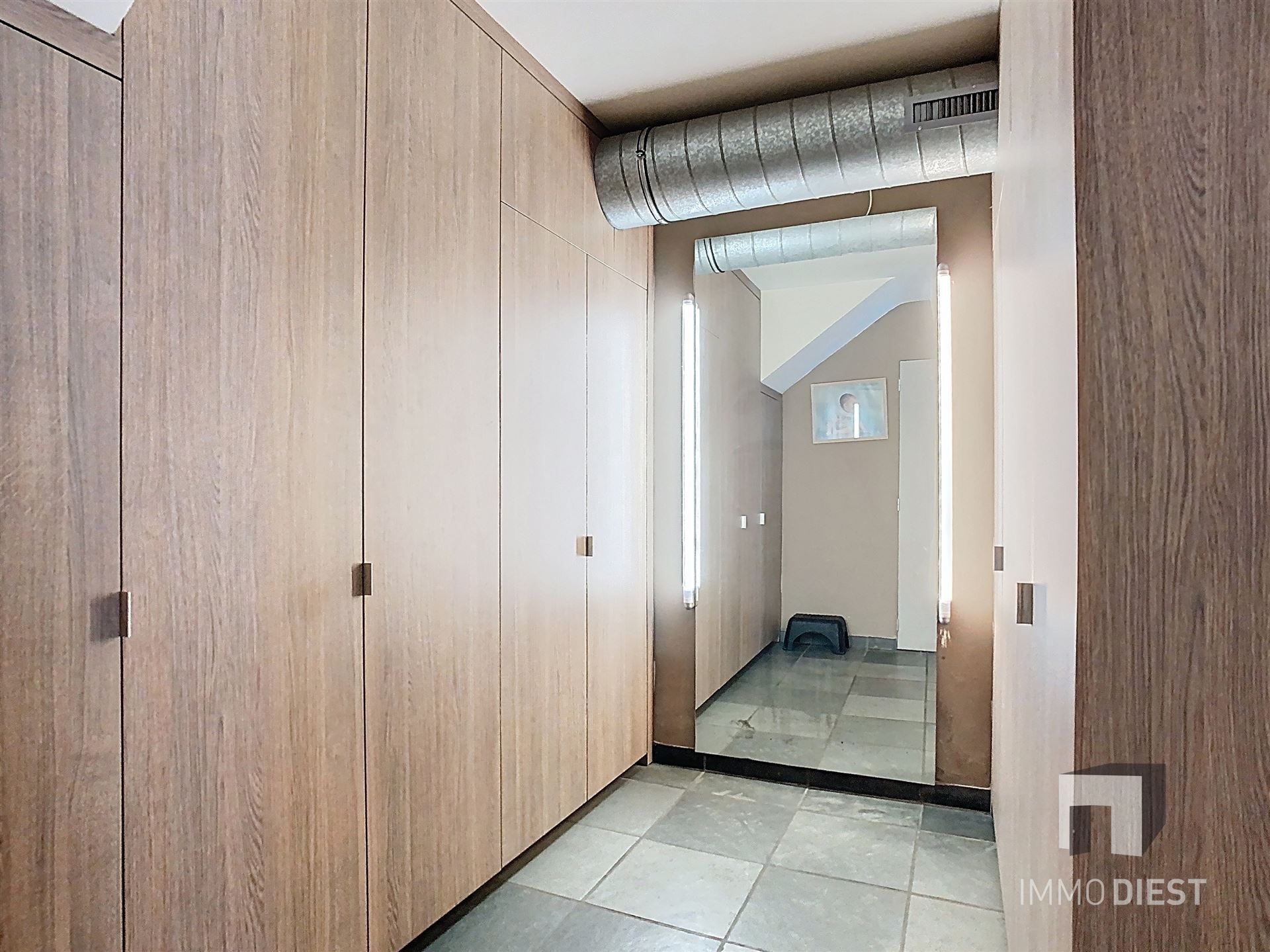 Hippe splitlevel met 3 slaapkamers in hartje Zichem. foto 24