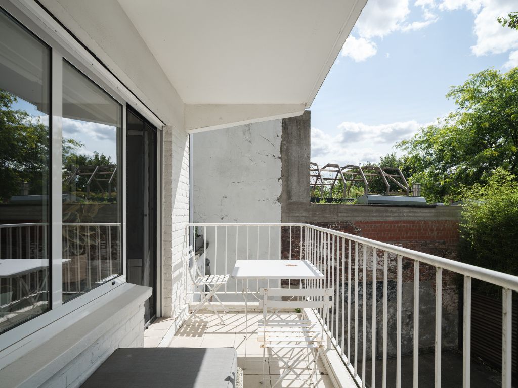 Instapklaar appartement met uniek waterzicht en zonnig terras foto 6