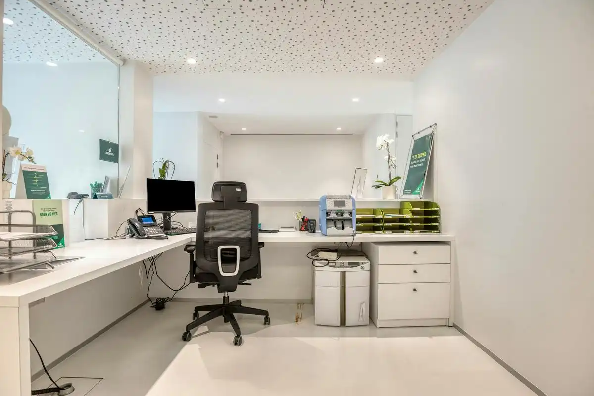 Verhuurde opbrengsteigendom met handelsruimte en duplex  foto 7