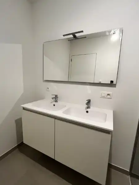 App met 2  slpkm, garage en kelderberging foto 14