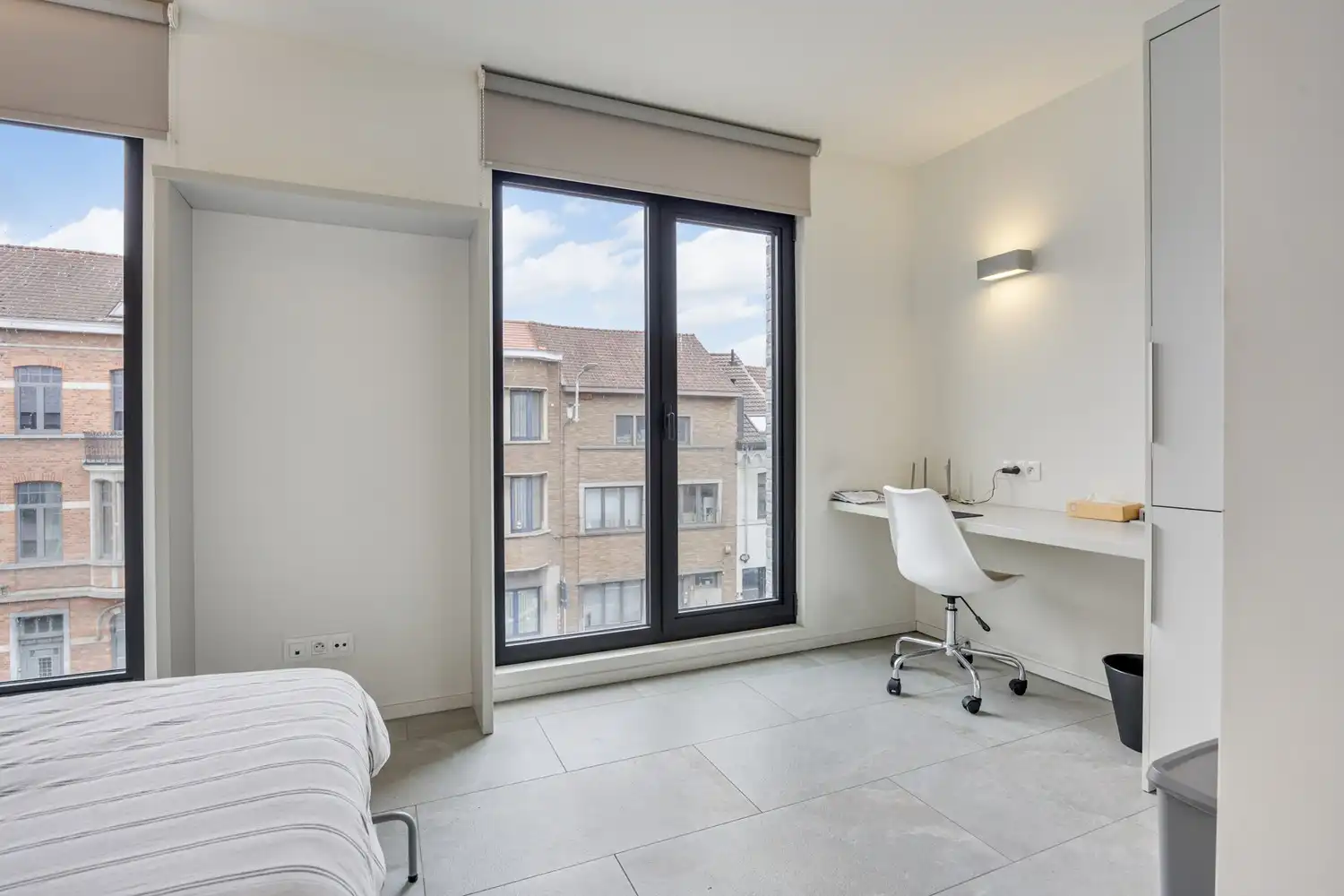 Moderne en lichtrijke studentenkamer met eigen sanitair nabij het station te Leuven! foto 6