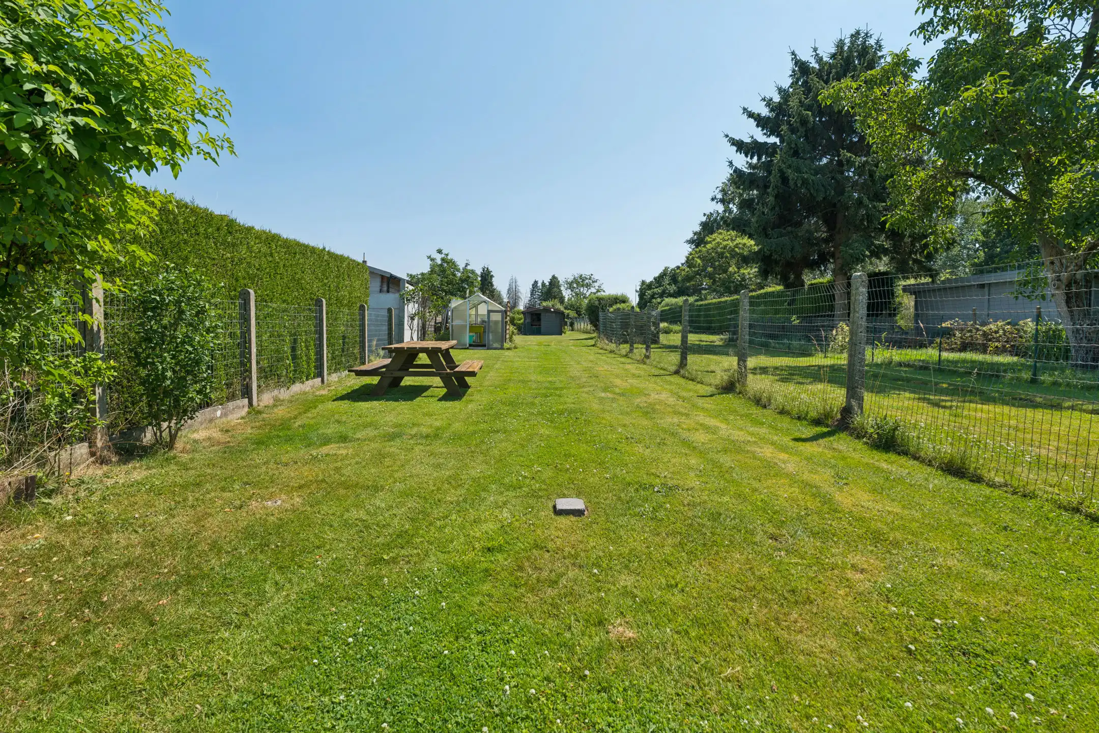 Gezinswoning met 3 slks en uitzonderlijk grote tuin foto 19