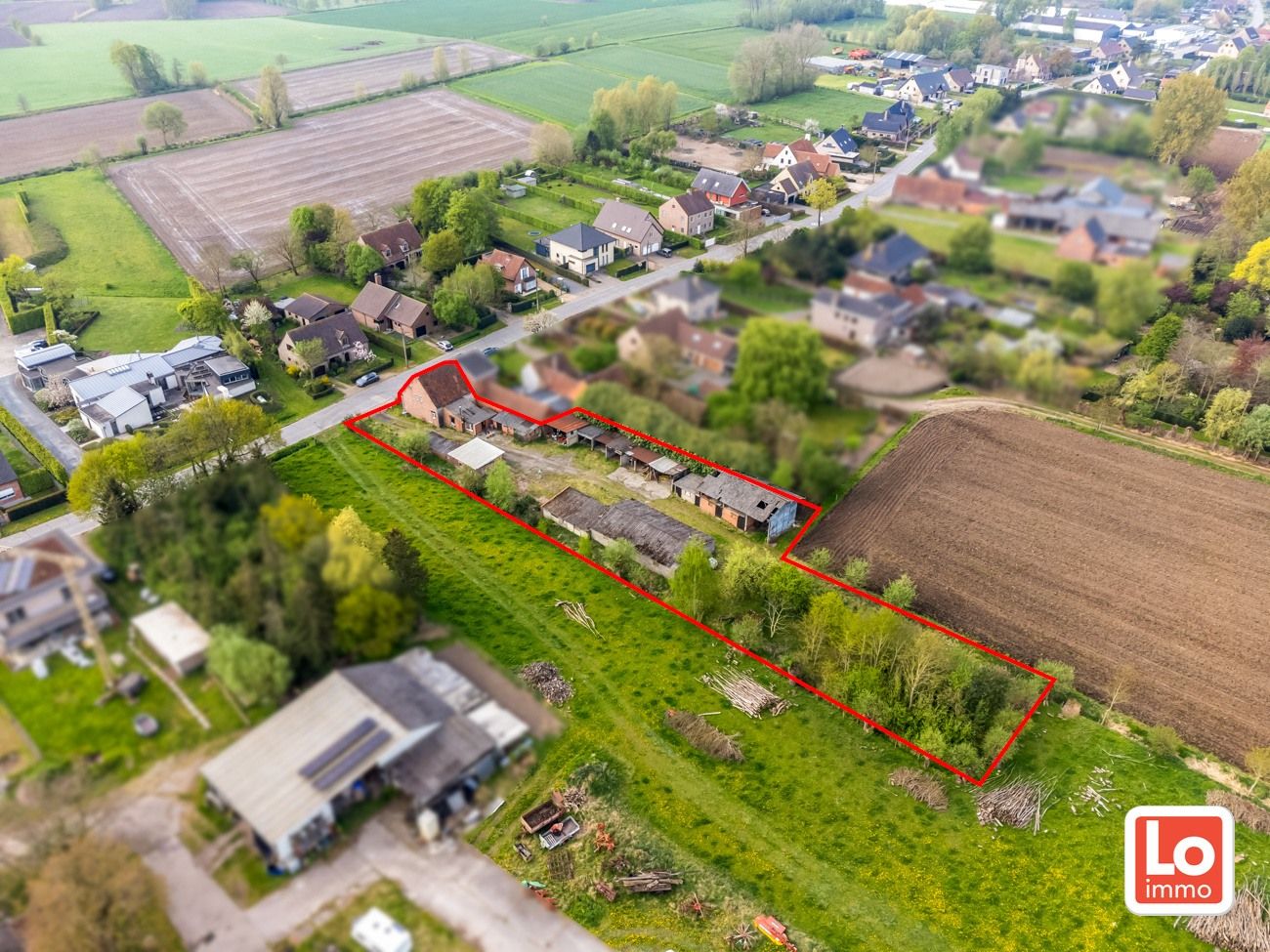 Landelijk gelegen halfopen woning met verschillende stallingen op groot perceel grond met open zicht in Zeveneken! foto 20