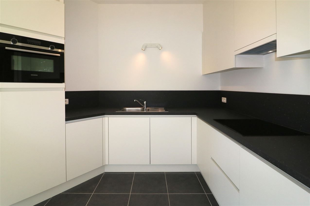 Bijzonder opgevat penthouse, 2 slpk., garage, groot terras foto 10