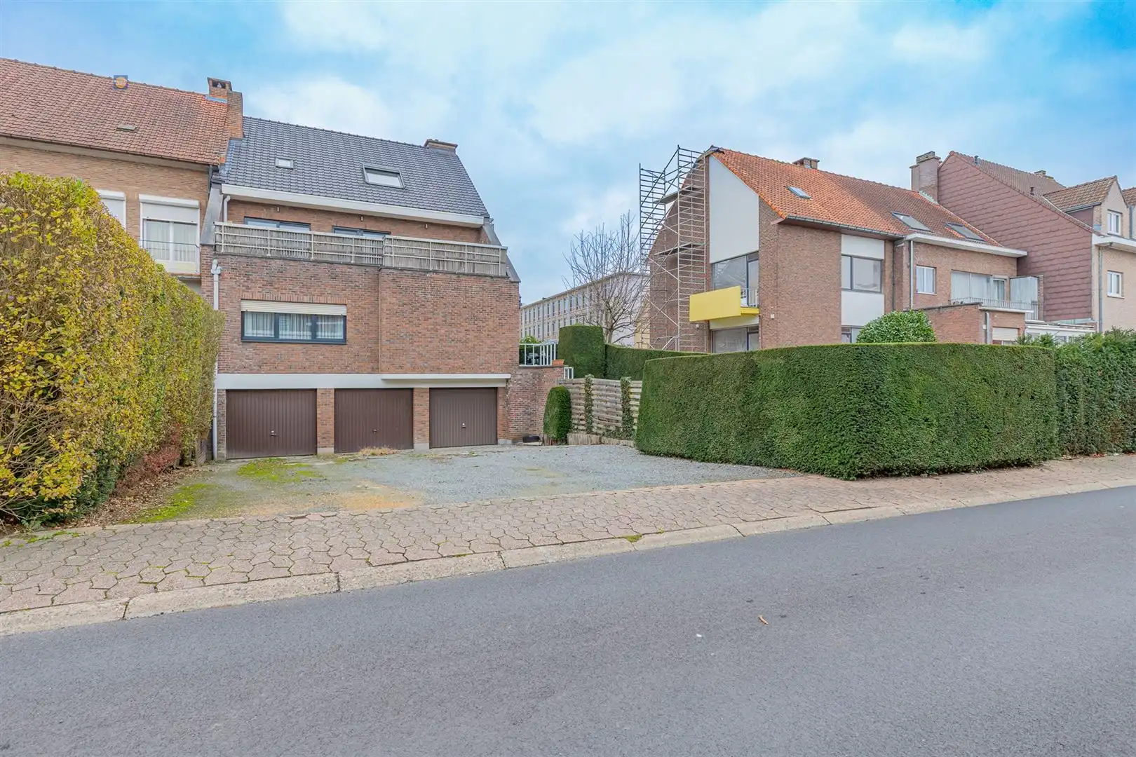 Gelijkvloers 2-slaapkamerappartement met tuin en garage foto 18