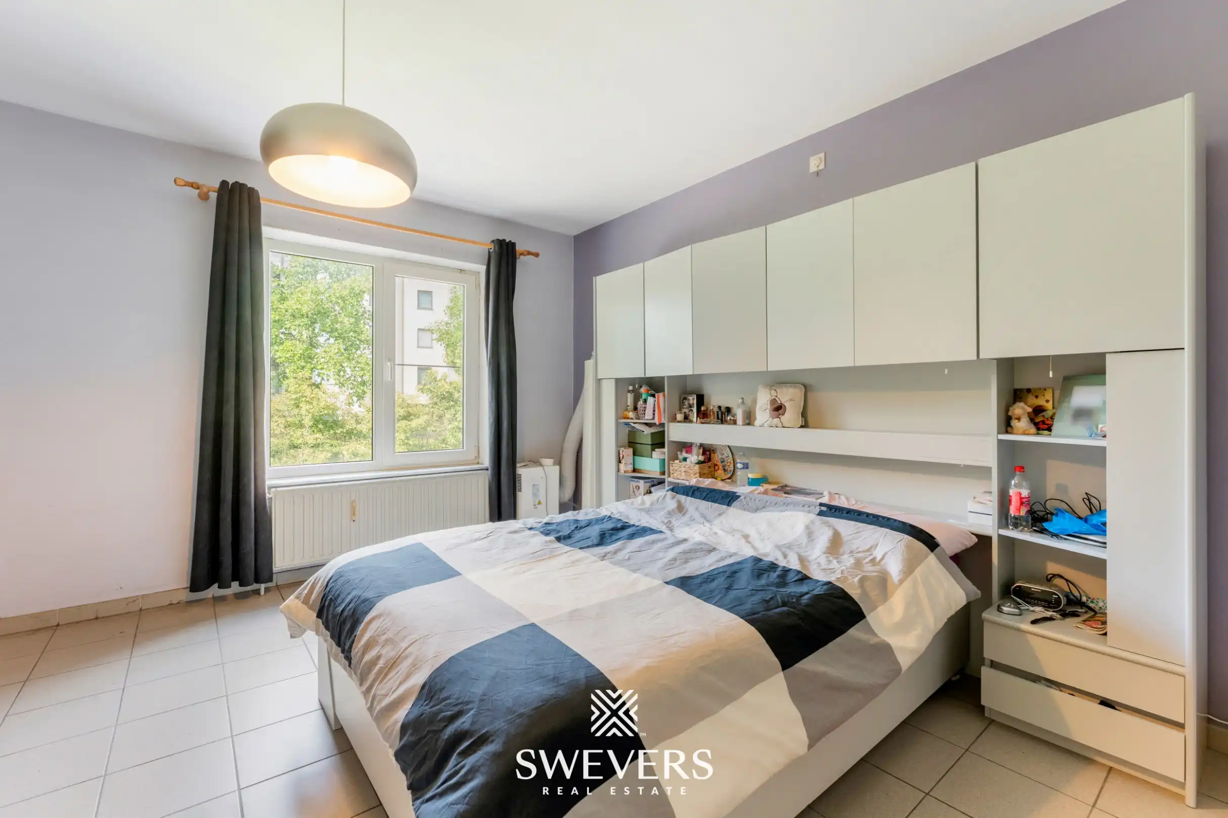 Ruim gelijkvloers 3-slaapkamerappartement inclusief autostaanplaats en kelderberging nabij Hasselt-centrum foto 16
