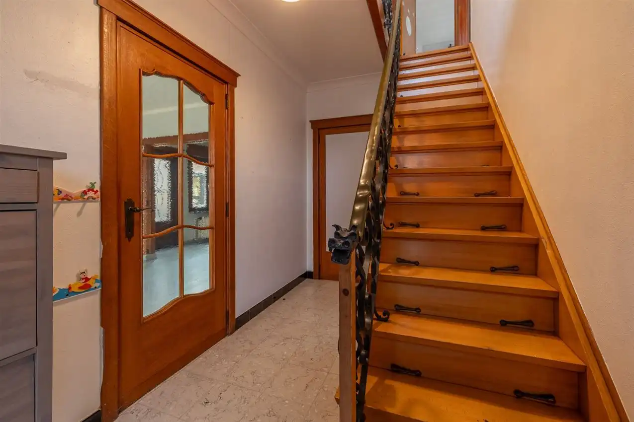 Woning met 3slk, tuintje en werkhuis foto 4