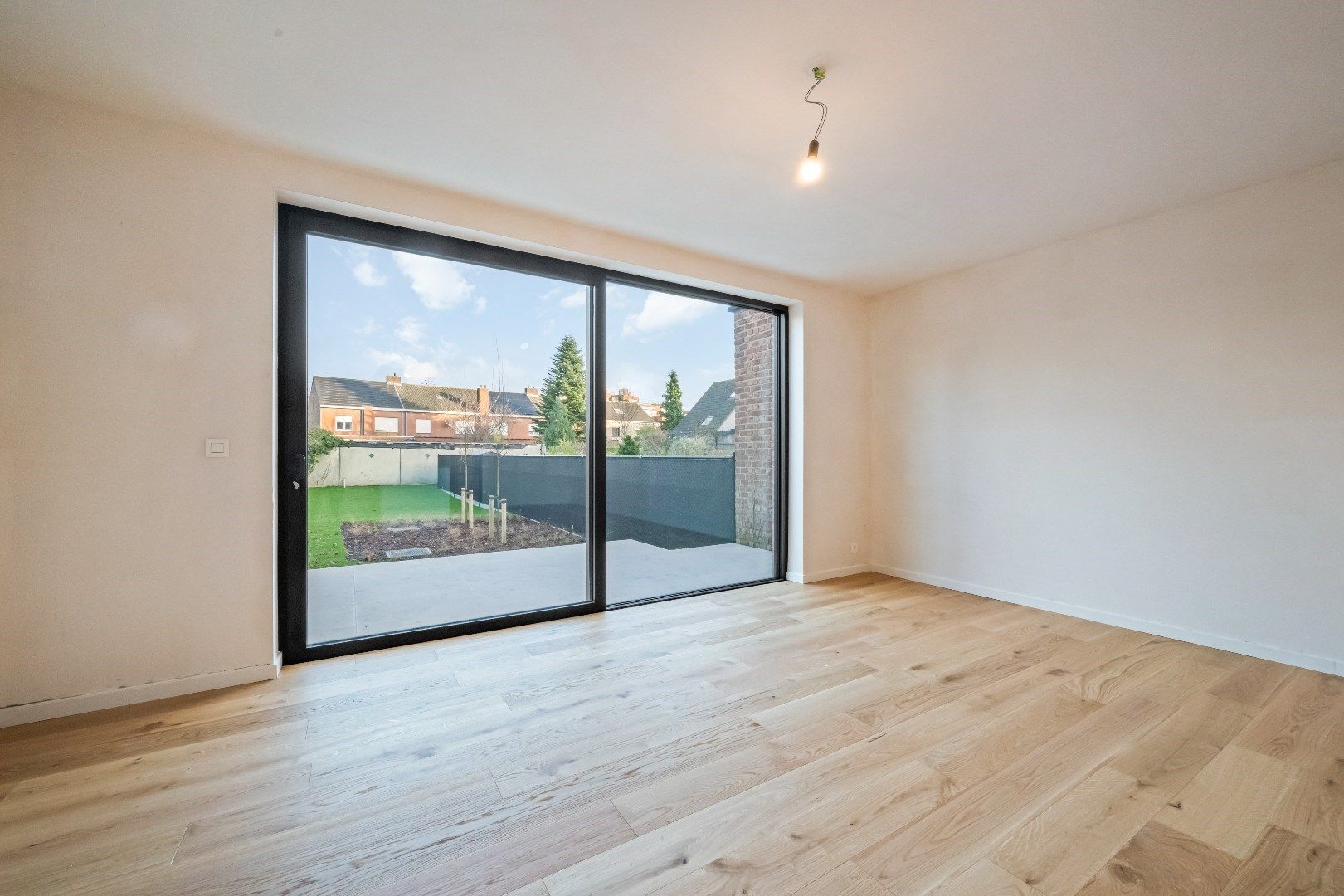 Gelijkvloers en zeer energiezuinig appartement met mooie tuin ! foto 4