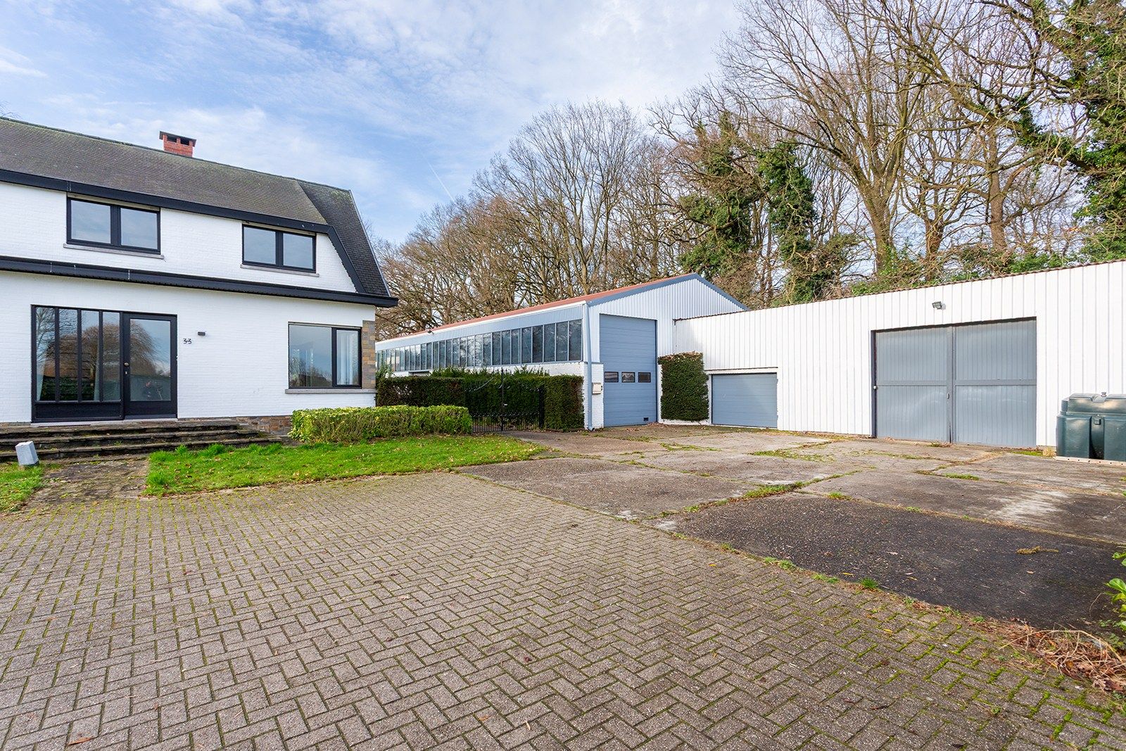 Villa met grote tuin, magazijn én weiland foto 17