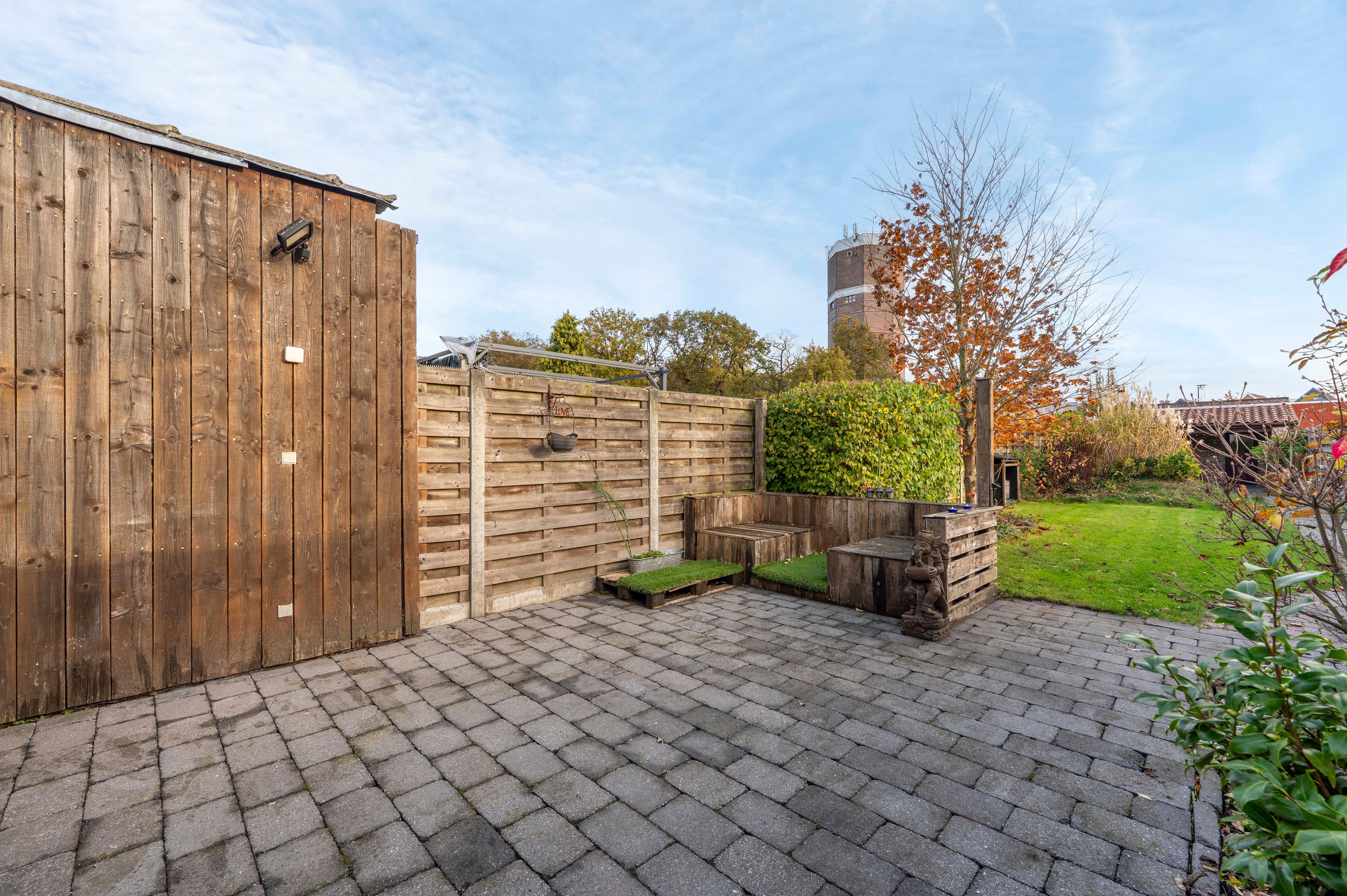 Verrassende woning met leuke tuin en grote garage nabij centrum Kapellen! foto 16