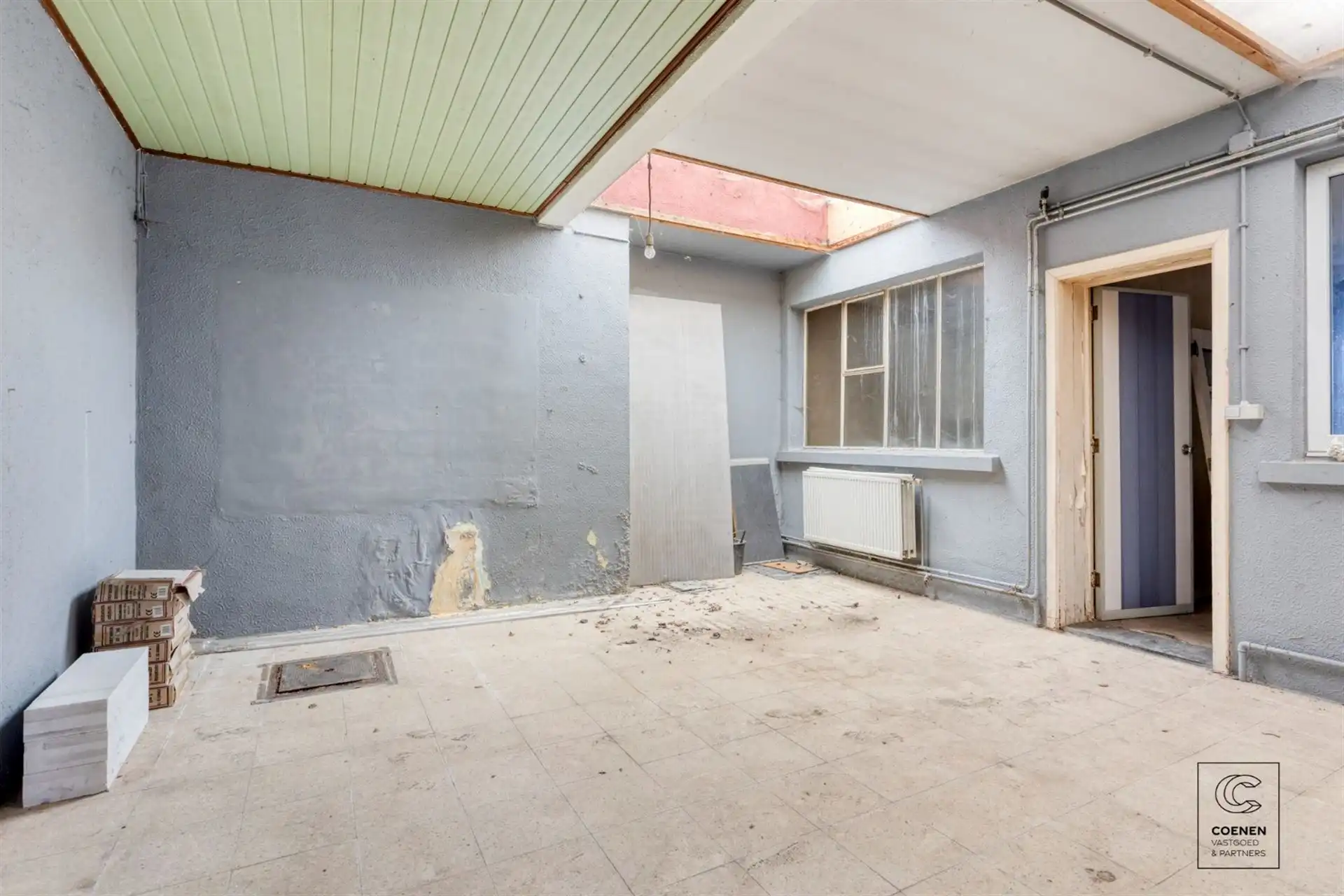 Te renoveren app. met handelsruimte op een gunstige locatie! foto 11