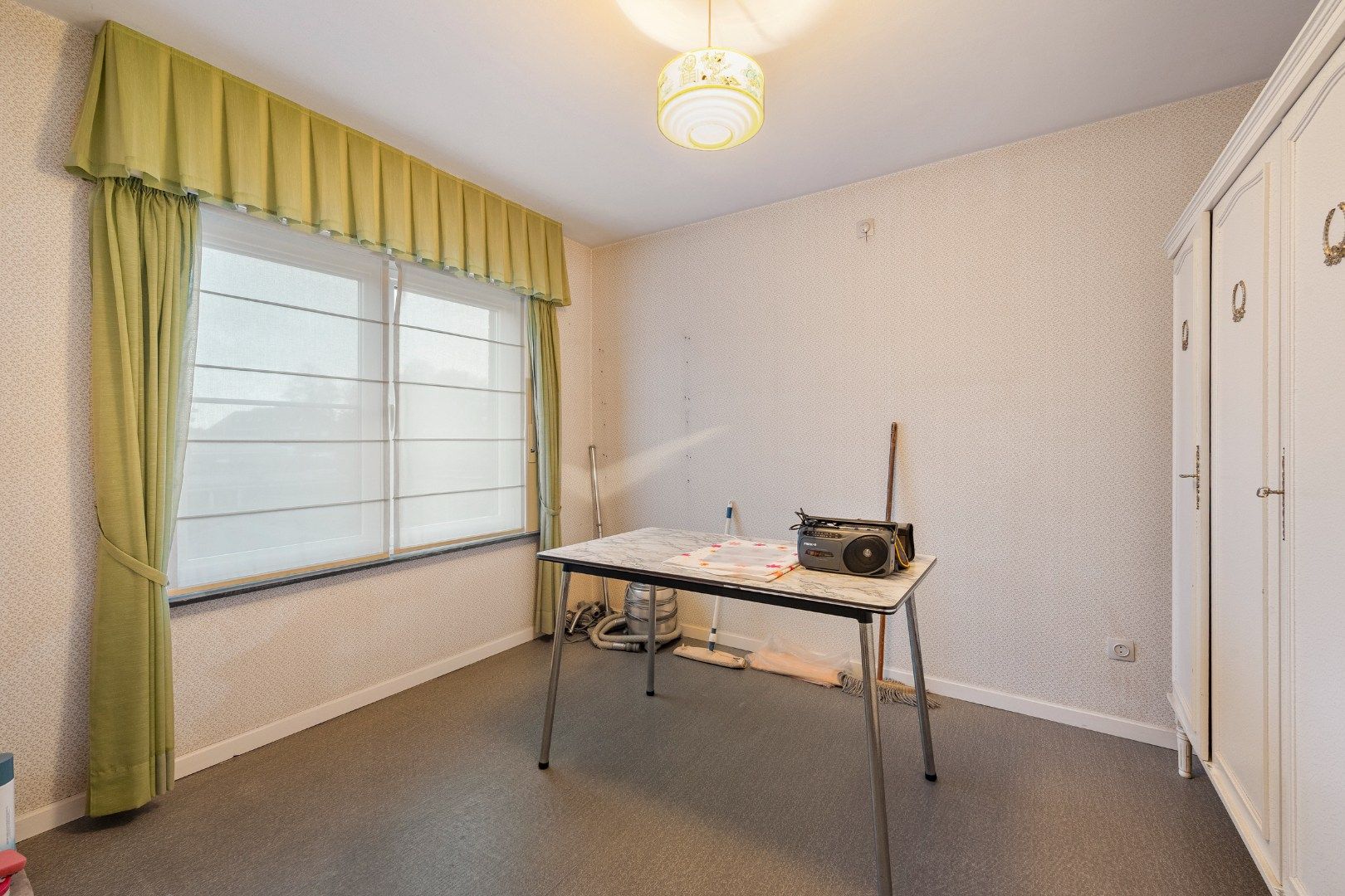 Halfopen woning met 4 slaapkamers, garage met oprit en zuidgerichte tuin in Dadizele-centrum foto 11