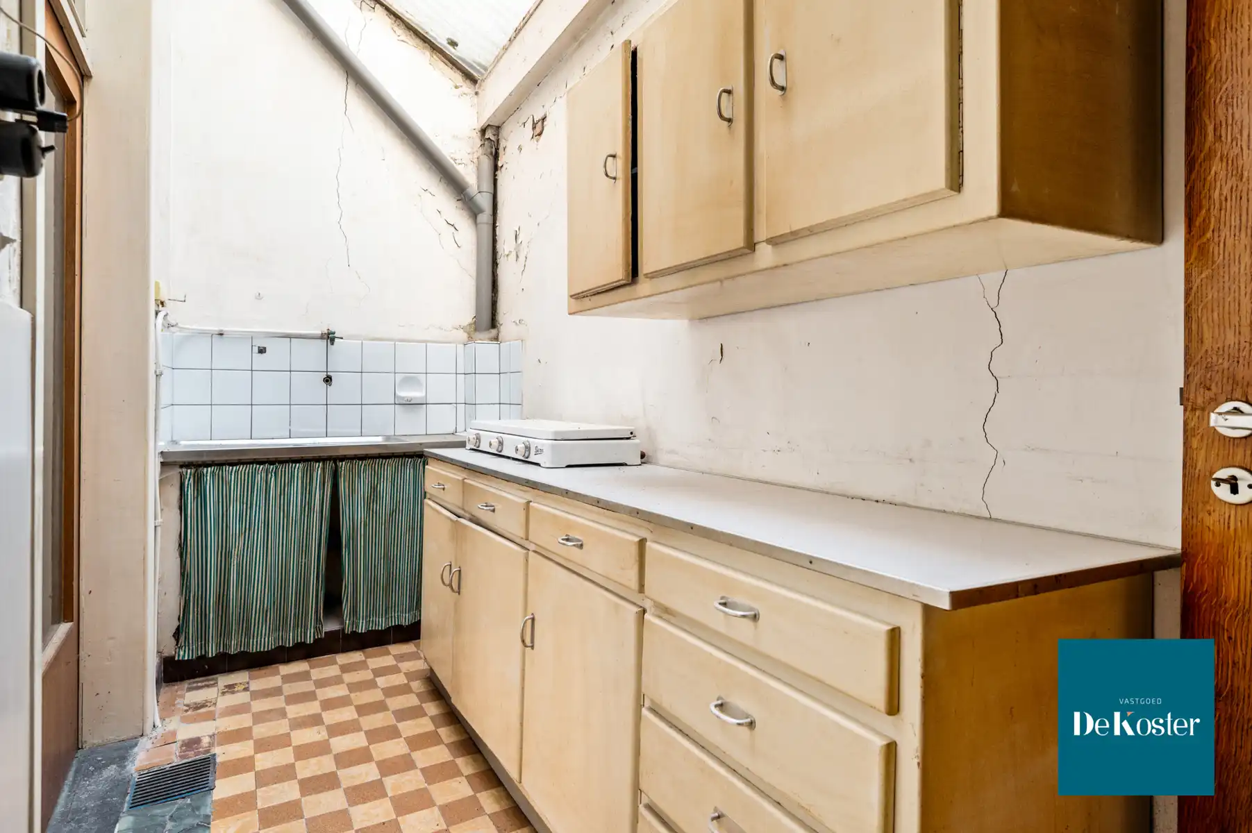 Te renoveren woning met 4 slaapkamers op centrale ligging foto 9