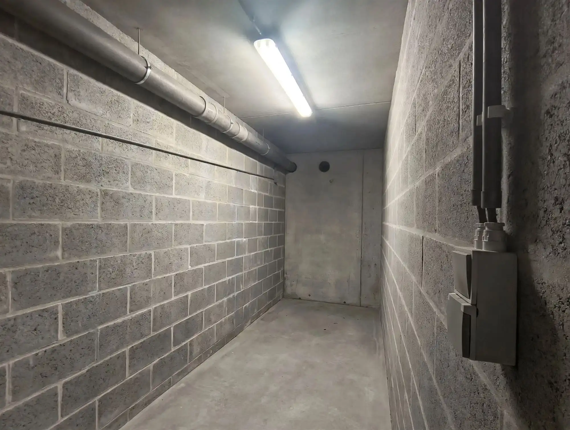 Appartement - Gelijkvloers - met 2 slaapkamers, groot terras en ondergrondse autostaanplaats foto 17