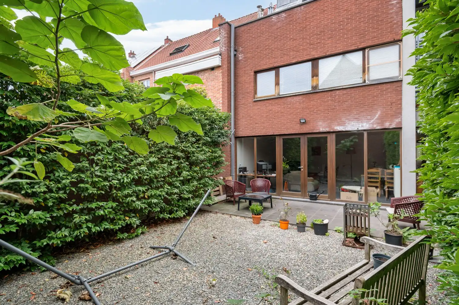 Gelijkvloers 2-slaapkamerappartement met tuin en garagebox foto 11