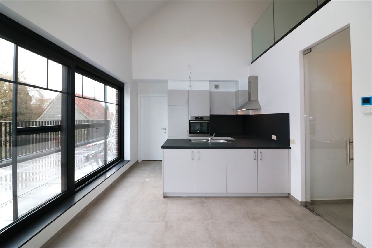 Unieke duplex met twee slpk, terras, autostaanplaats, label A foto 7