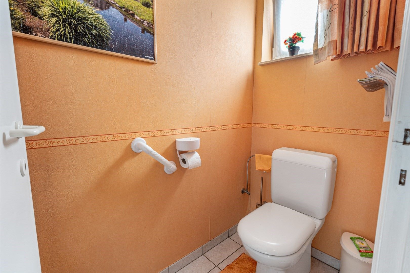 Verzorgd gelijkvloers appartement met 2 slaapkamers, ruim terras, garage en berging foto 7