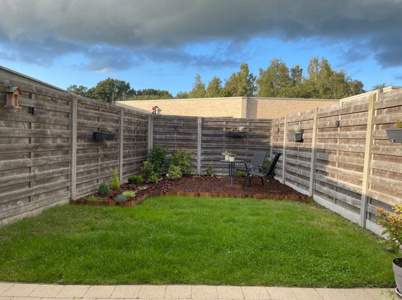 Gelijkvloers appartement met tuin en 2 autostaanplaatsen (1 ondergronds met berging en 1 bovengronds) foto 2