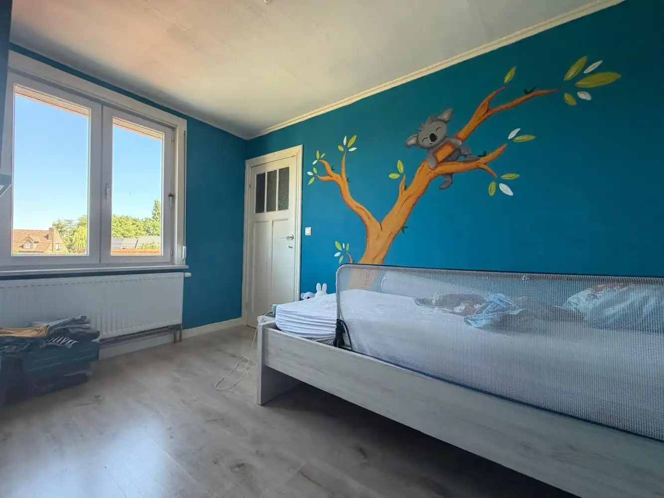 Instapklare woning met 3 slpks. + garage én zonnige tuin foto 6
