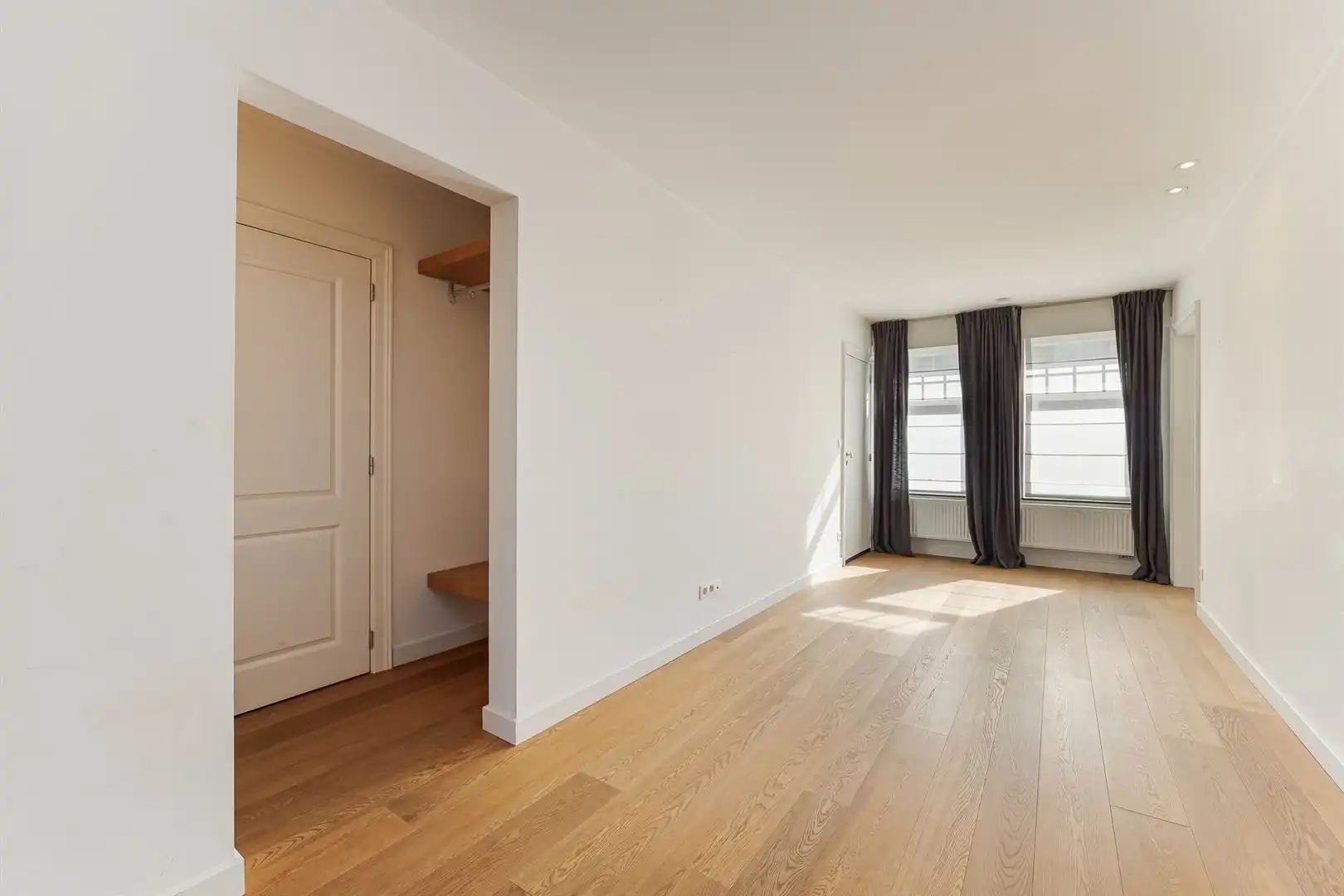 Gelijkvloers appartement met 2 slaapkamers en garage! foto 6