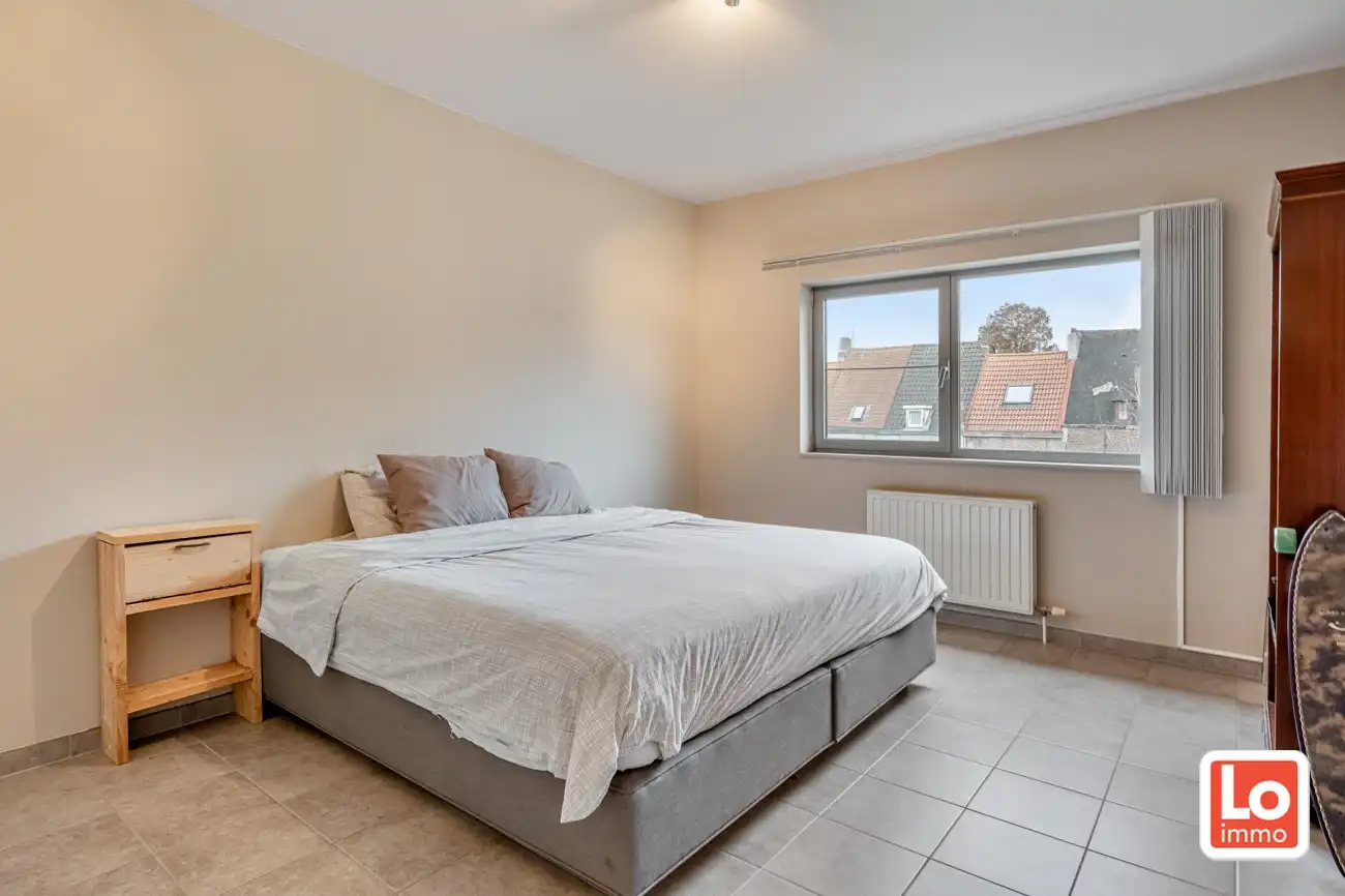 IN OPTIE! Ruim instap klaar appartement met overdekt terras en ondergrondse autostaanplaats op een toplocatie vlakbij het centrum van Lokeren! foto 11