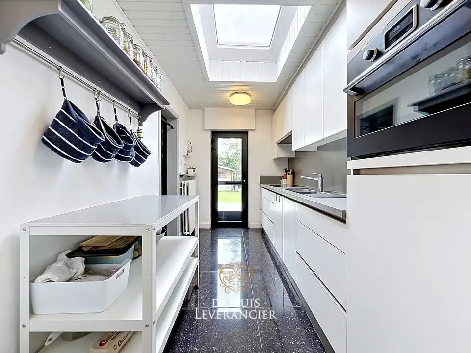 Instapklare rijwoning met tuin op rustige ligging te koop in Lint foto 7