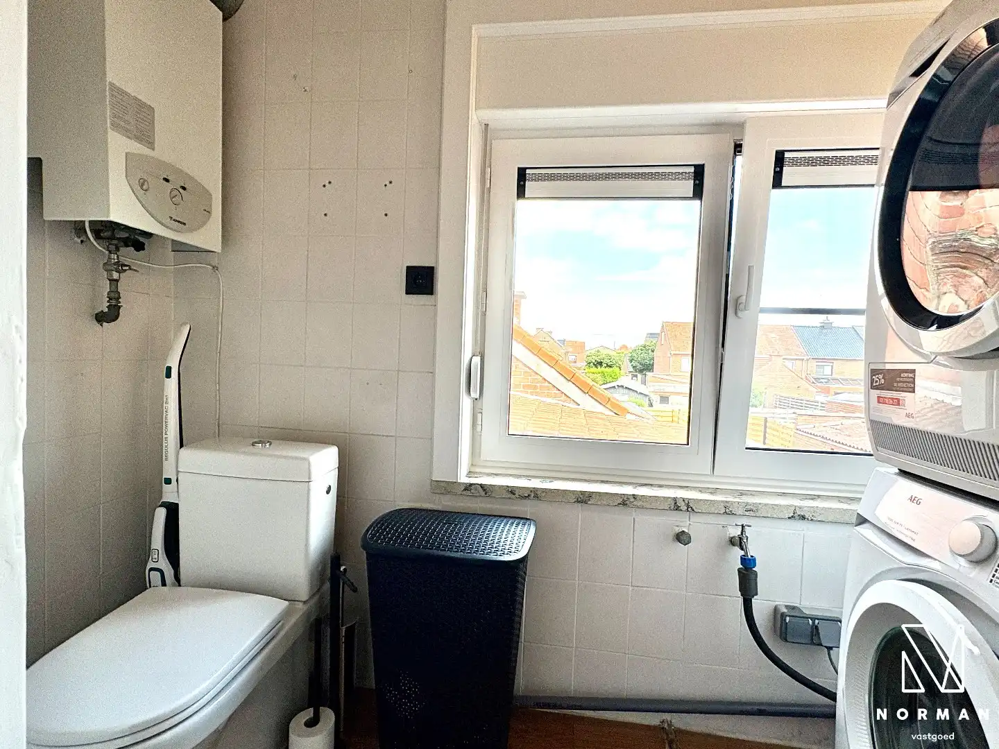 Instapklare woning te koop in rustige woonwijk te Bavikhove met tuin, garage en uitweg! foto 13