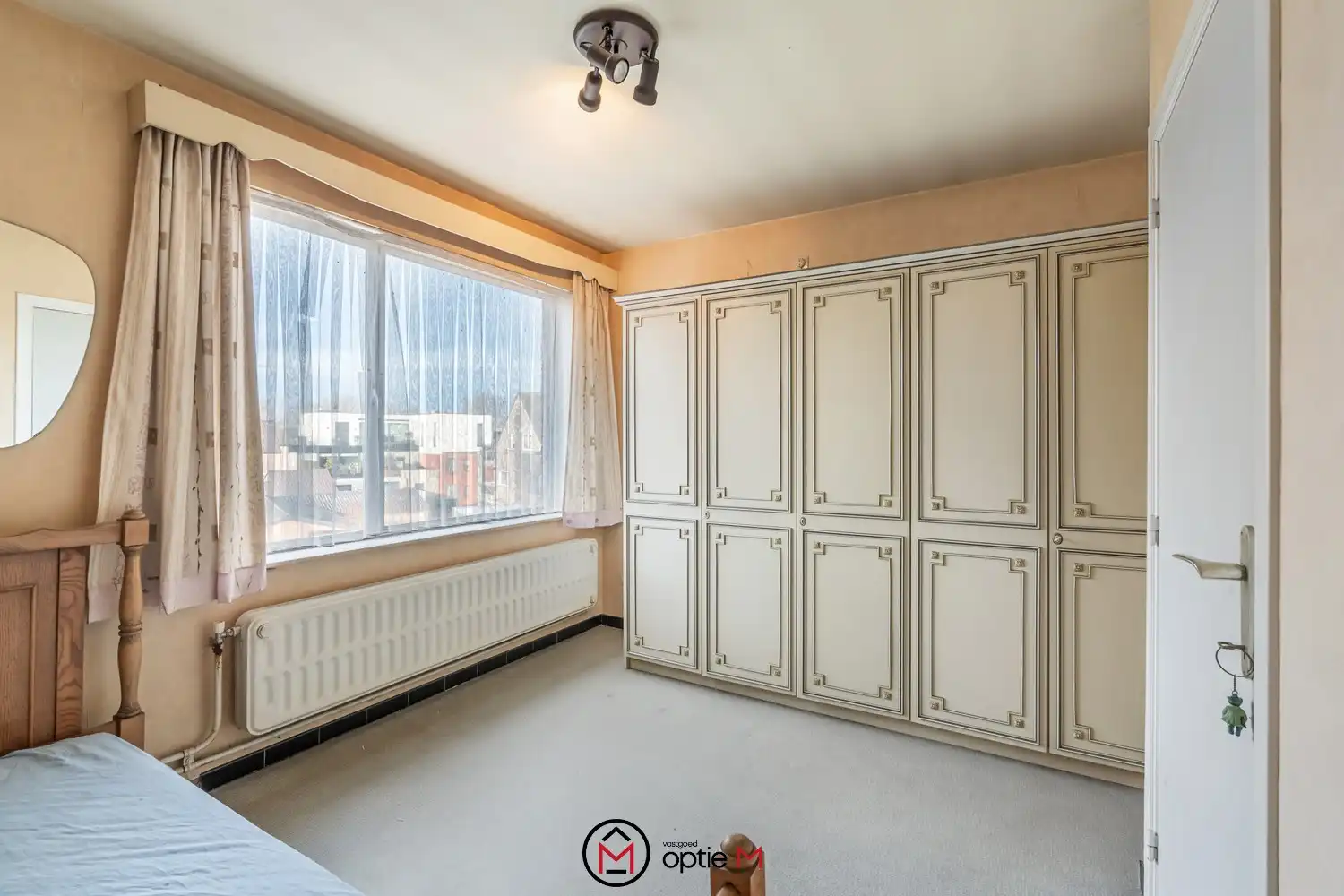 Karaktervolle woning met tuin te koop in centrum Bilzen foto 21