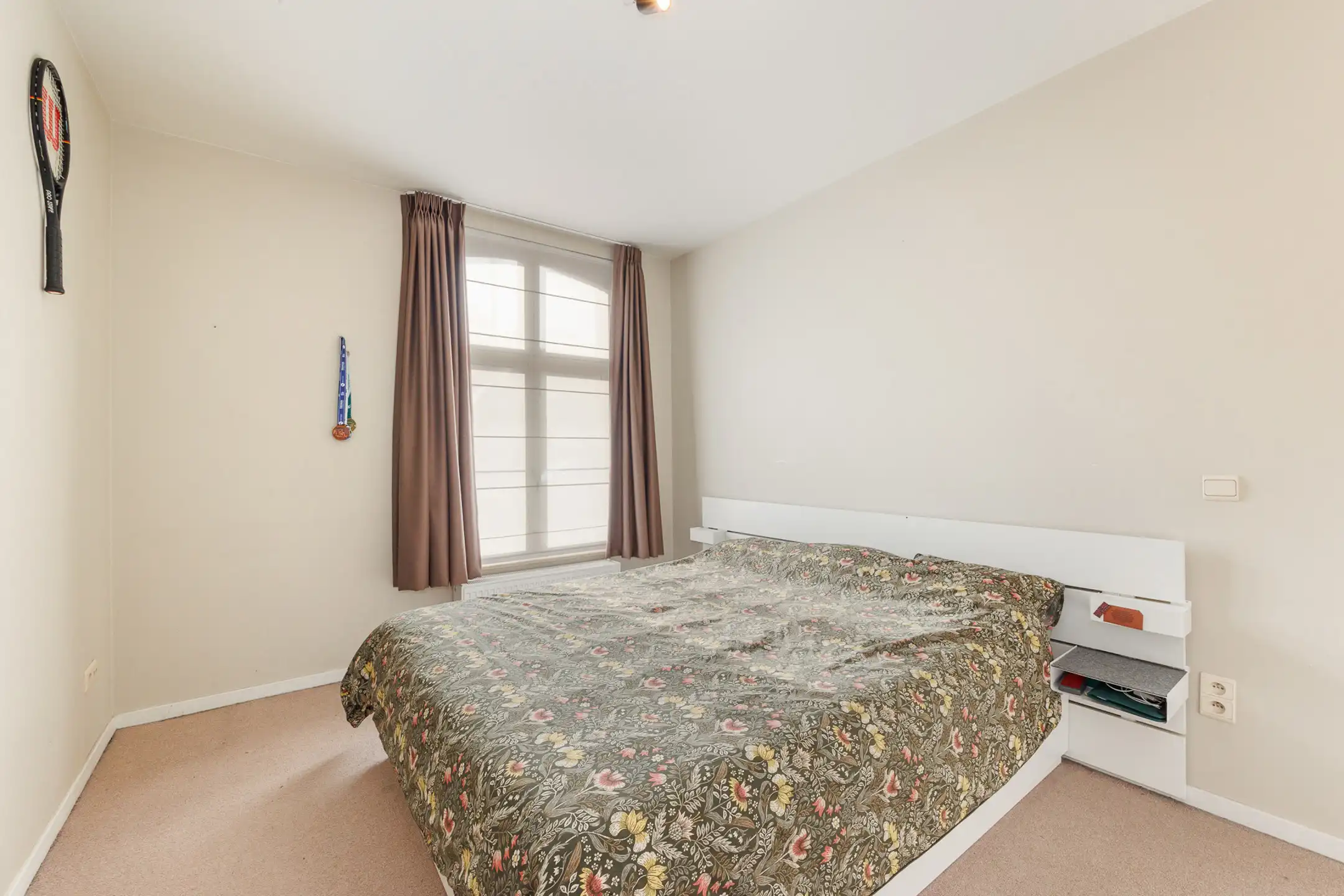 Gelijkvloers appartement met terras/tuintje te huur foto 11