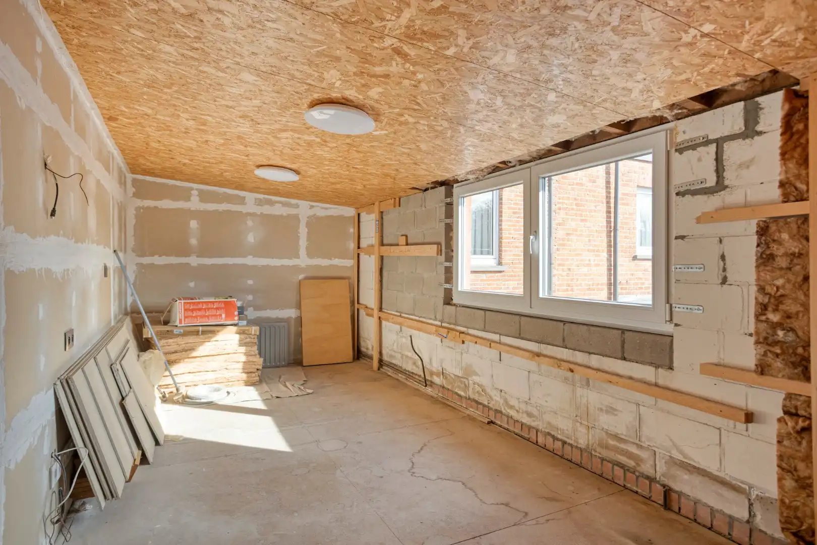 Woning met diepe tuin, garage en vernieuwd geïsoleerd dak, centrum Borgloon foto 22