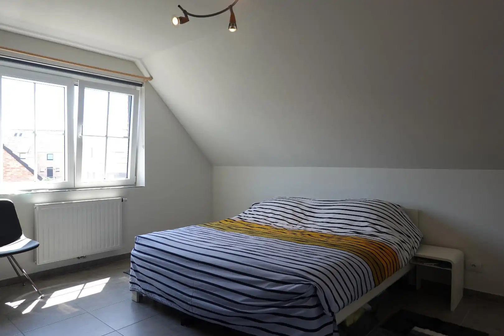 Prachtige halfopen nieuwbouwwoning met inpandige garage en zuidgerichte tuin foto 9