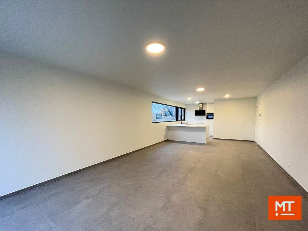 Nieuwbouwappartement met 2 slaapkamers, Zuidgericht terras en autostaanplaats te huur in Passendale foto 6