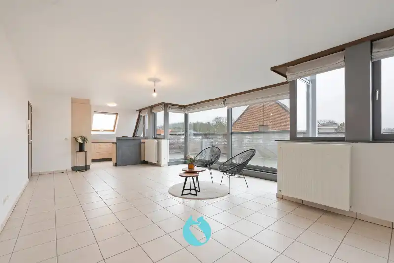 Dit prachtig en ruim appartement met één van de mooiste terrassen te Evergem is gelegen in de Kapellestraat foto 4