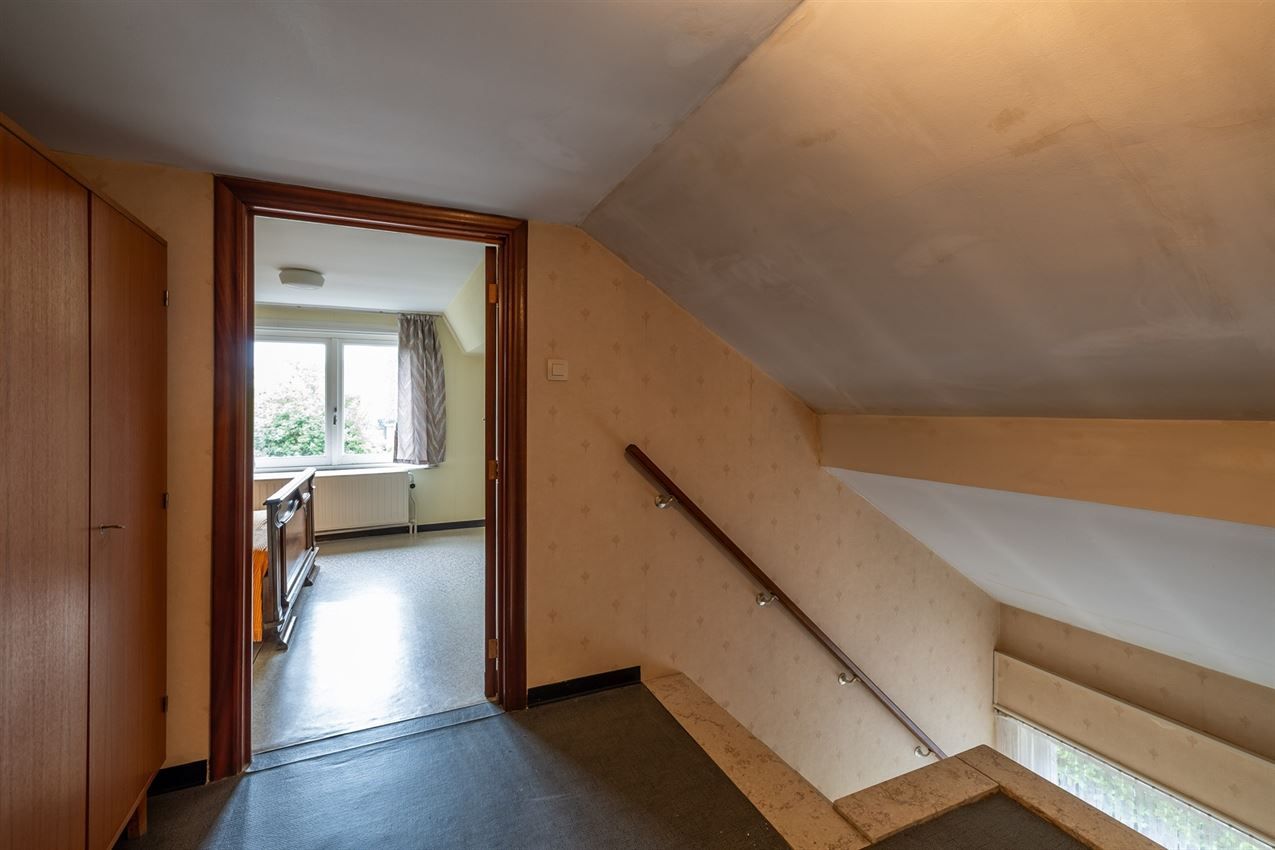 Te renoveren woning met 4 slk. in het hart van Averbode foto 23