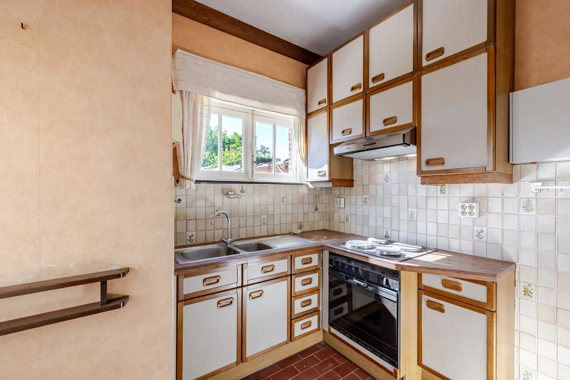 Te renoveren woning met 3 slks en zuidgerichte tuin foto 10