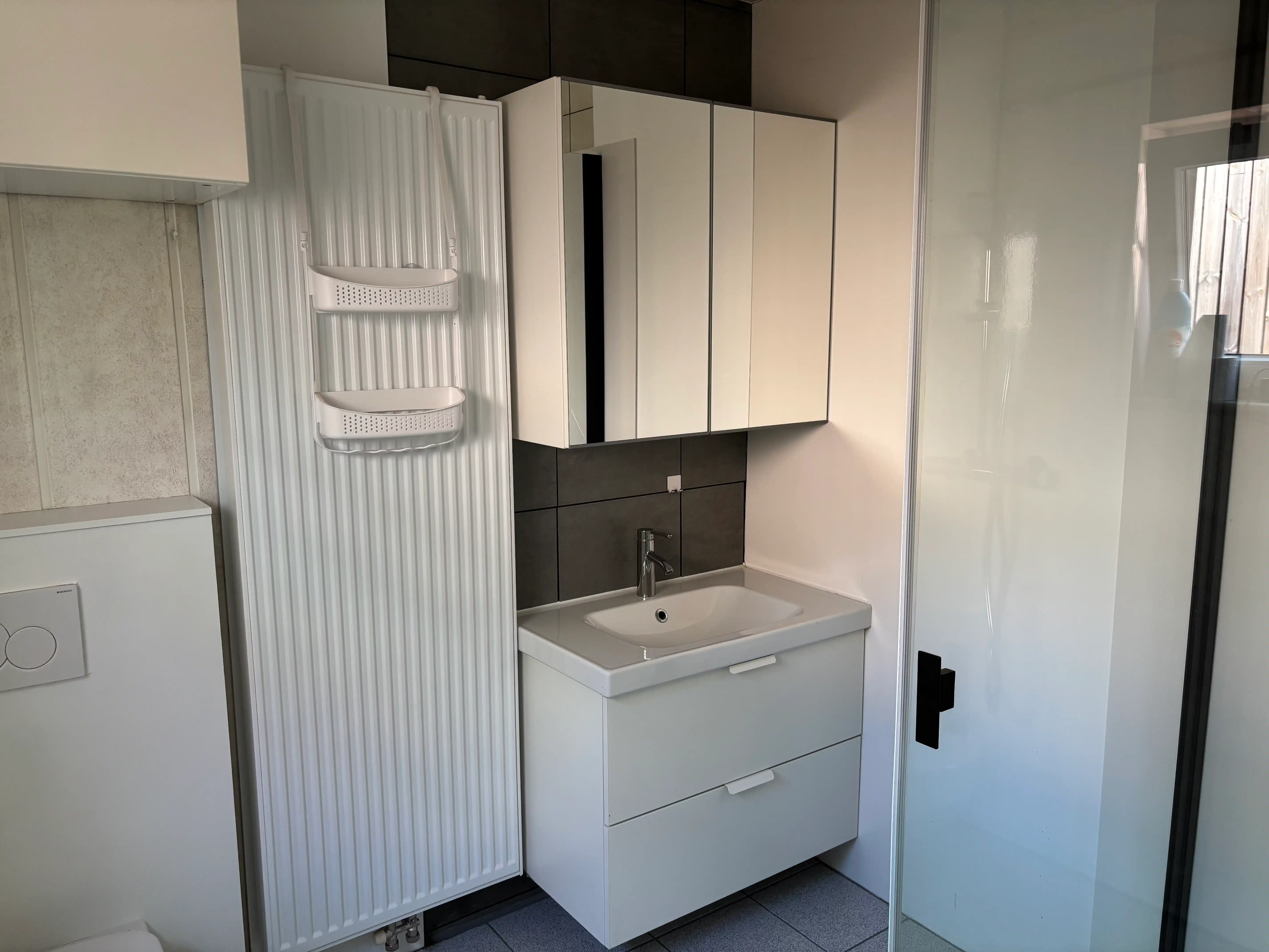 Gezellige rijwoning 4 slaapkamers + garage en stadstuin foto 9