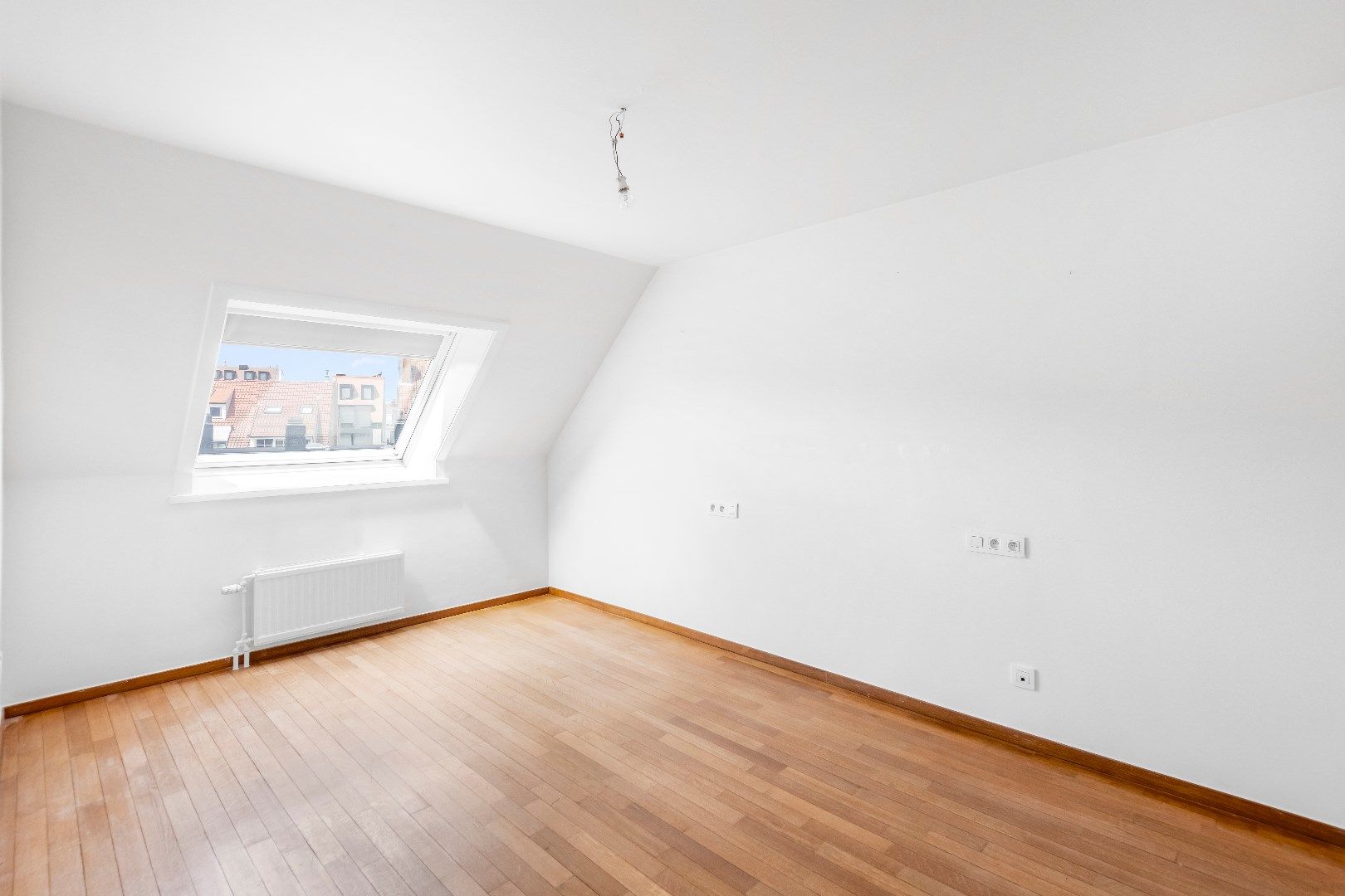 Duplex dakappartement met drie slaapkamers en zonnige terrassen gelegen vlakbij in de Dumortierlaan. foto 14