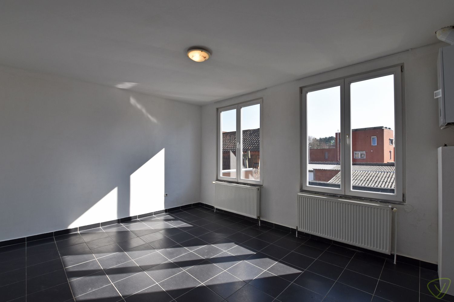 Ideale starterswoning: Centraal gelegen appartement nabij de Markt van Eeklo! foto 7