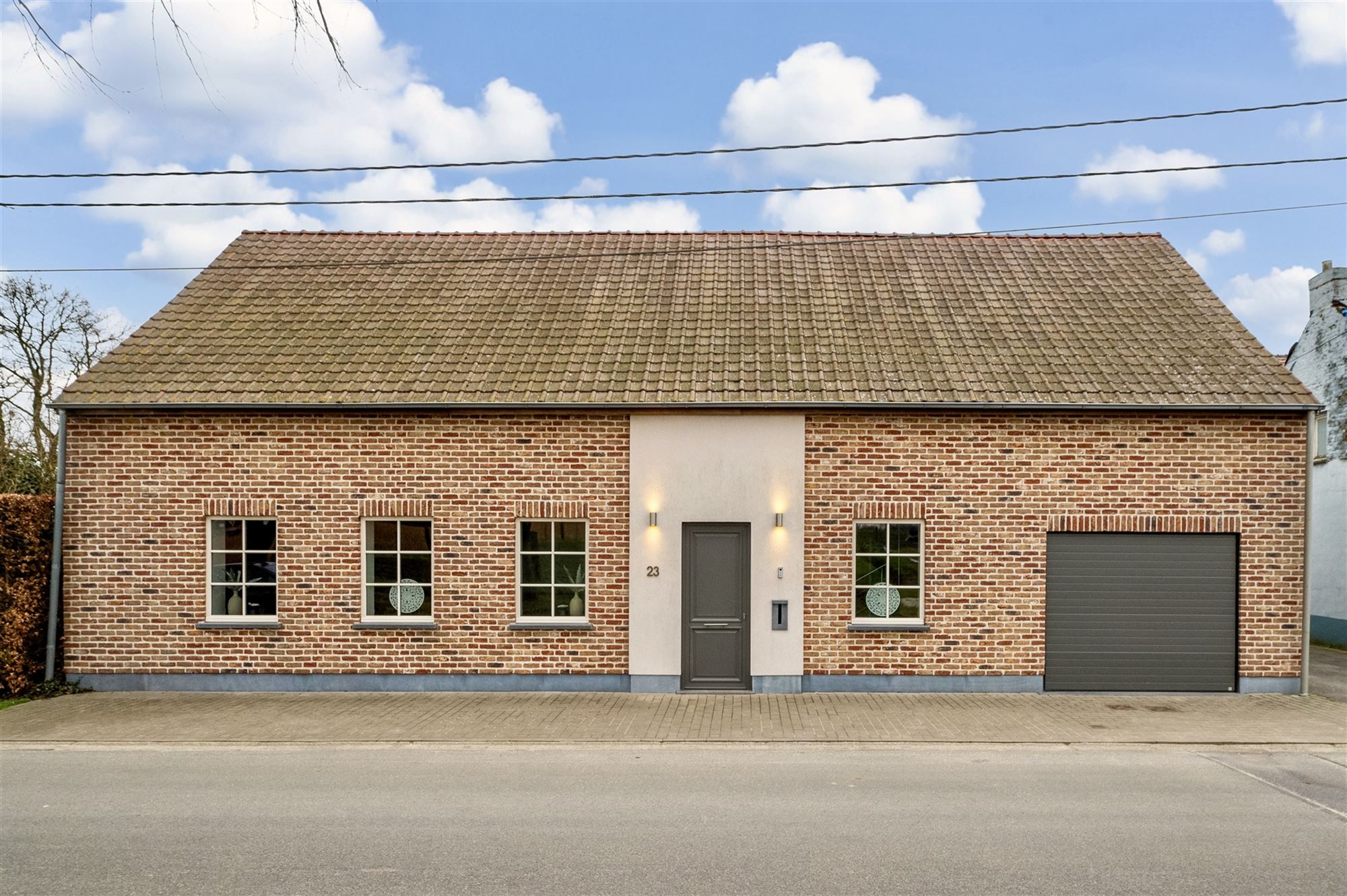 Uiterst charmante woning met 2 slpks, tuin en garage foto 3