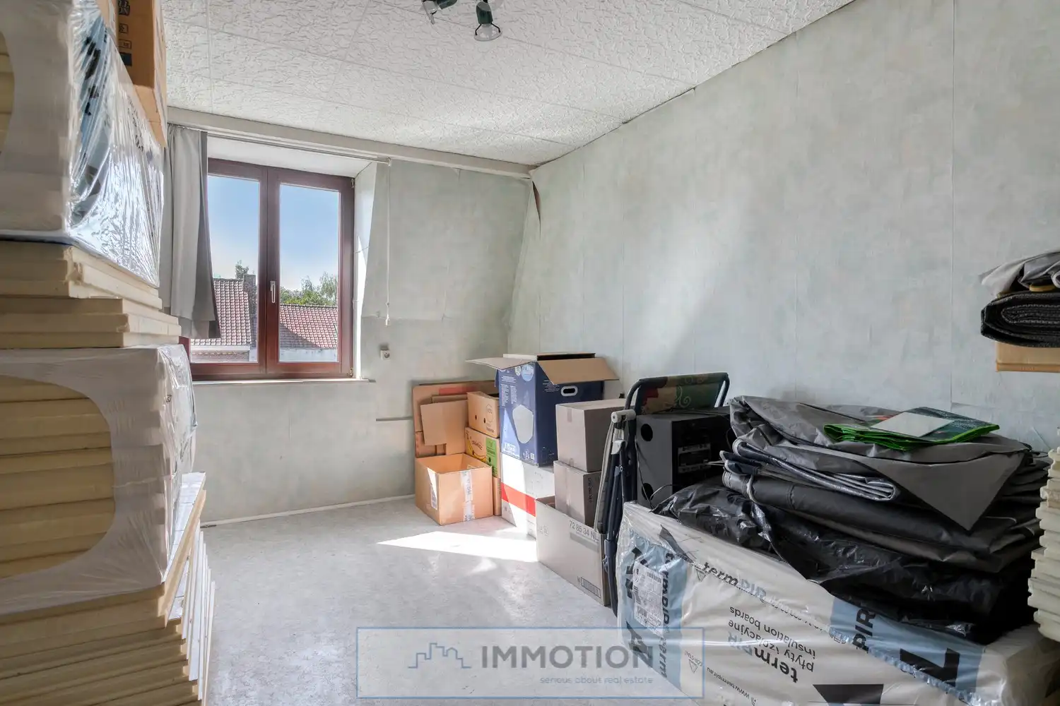 Karaktervolle stadswoning met renovatiepotentieel en unieke troef foto 12