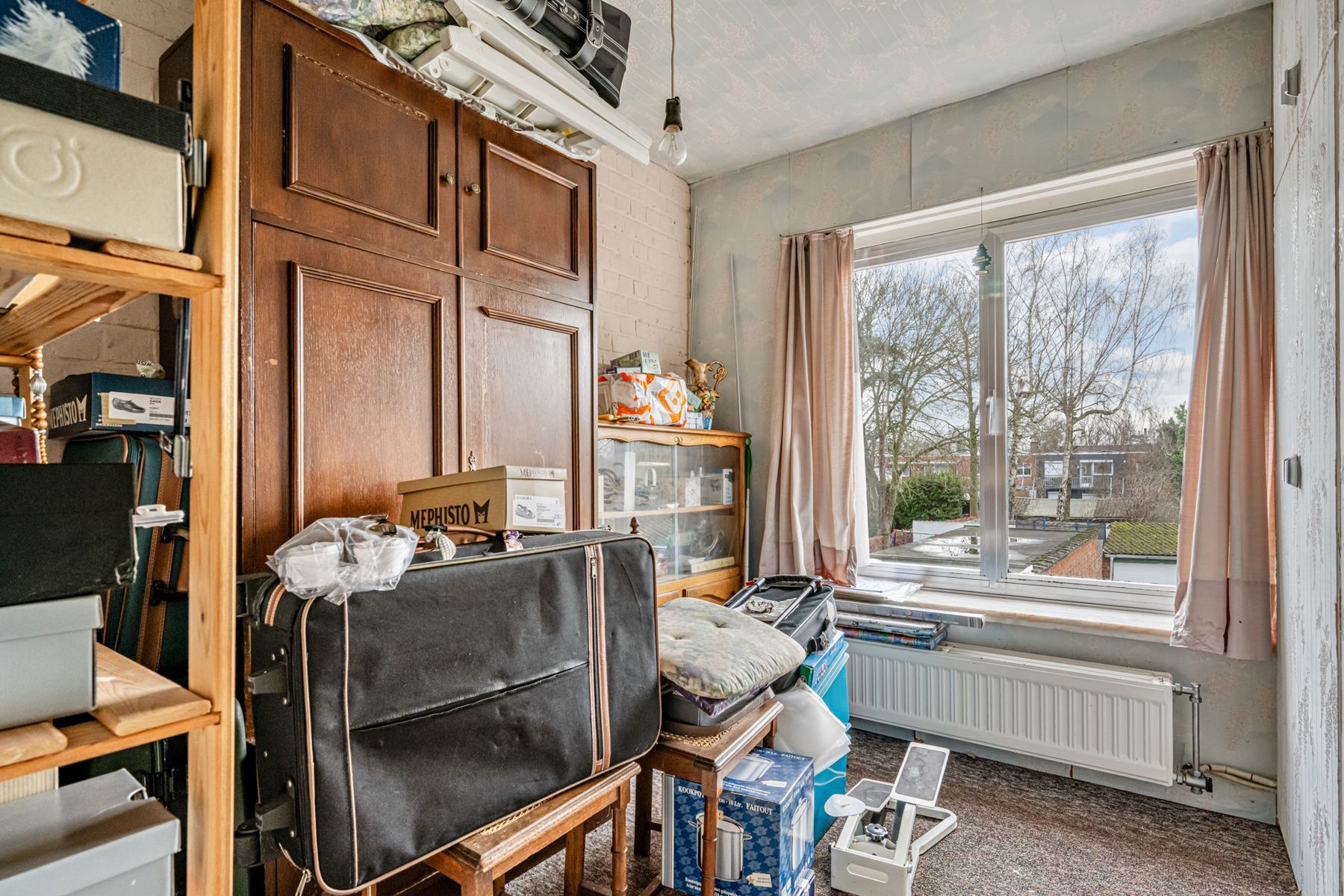 Te renoveren woning met 4 slaapkamers + 9 garageboxen foto 14